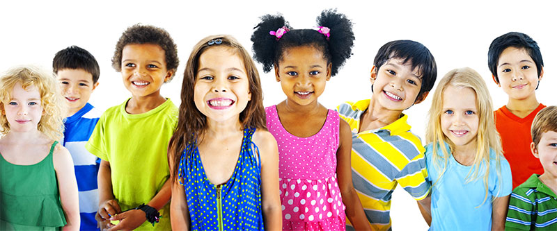 The image features a group of children and young adults posing together, with various expressions and colors in their clothing.